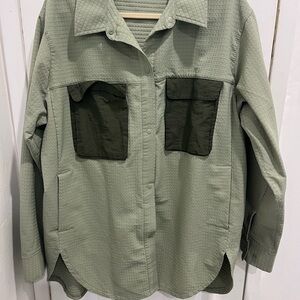 Green Button-Up Shirt with Dark Green Pockets